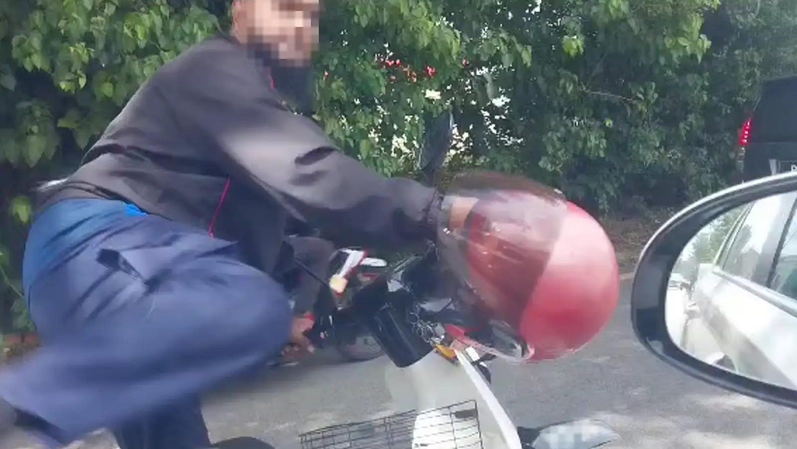 Motorcyclist Arrested in George Town After Viral Helmet Attack on Car