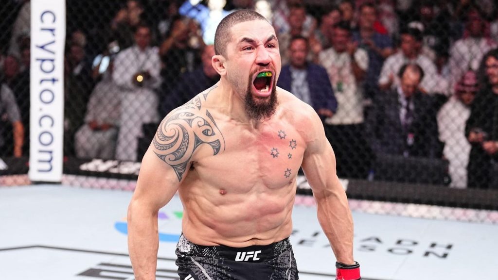 UFC Saudi Arabia: Whittaker's Dominant KO, Volkov's Victory, and Bonus Winners Revealed