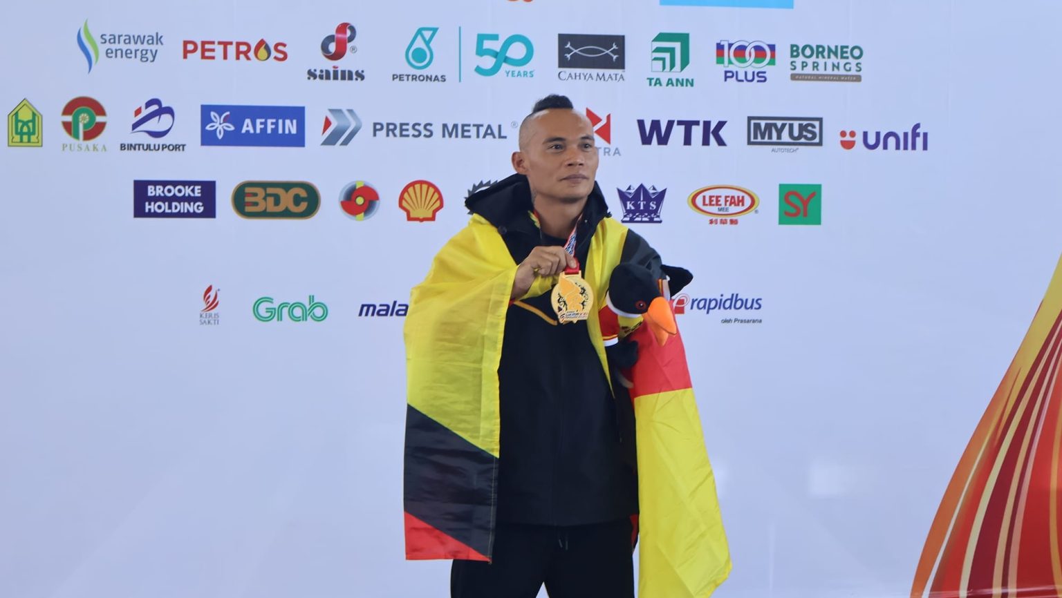 Sarawak Swimmer Galang Jabai Shines with Gold at Para SUKMA XXI