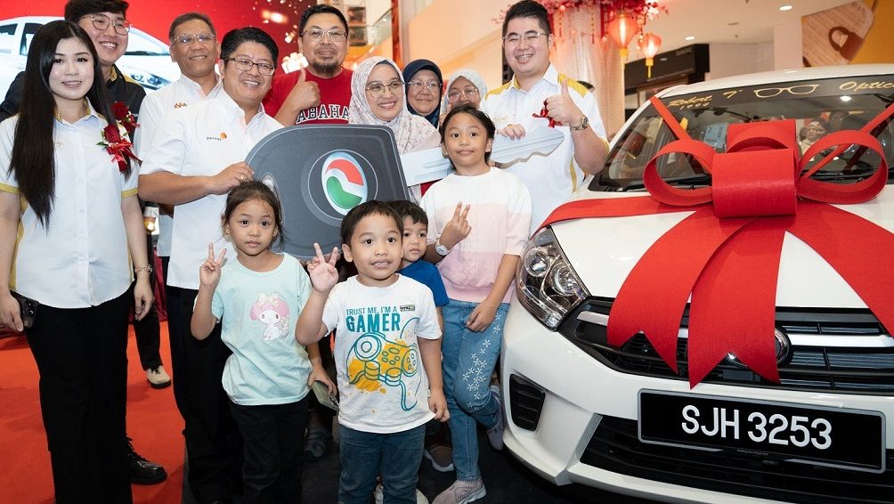 KK Boy Helps Mother Win Perodua Axia in Lucky Draw at Suria Sabah