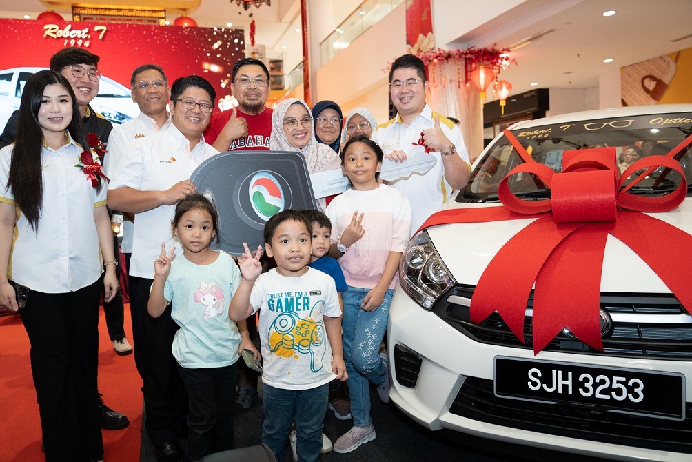 KK Boy Helps Mother Win Perodua Axia in Lucky Draw at Suria Sabah