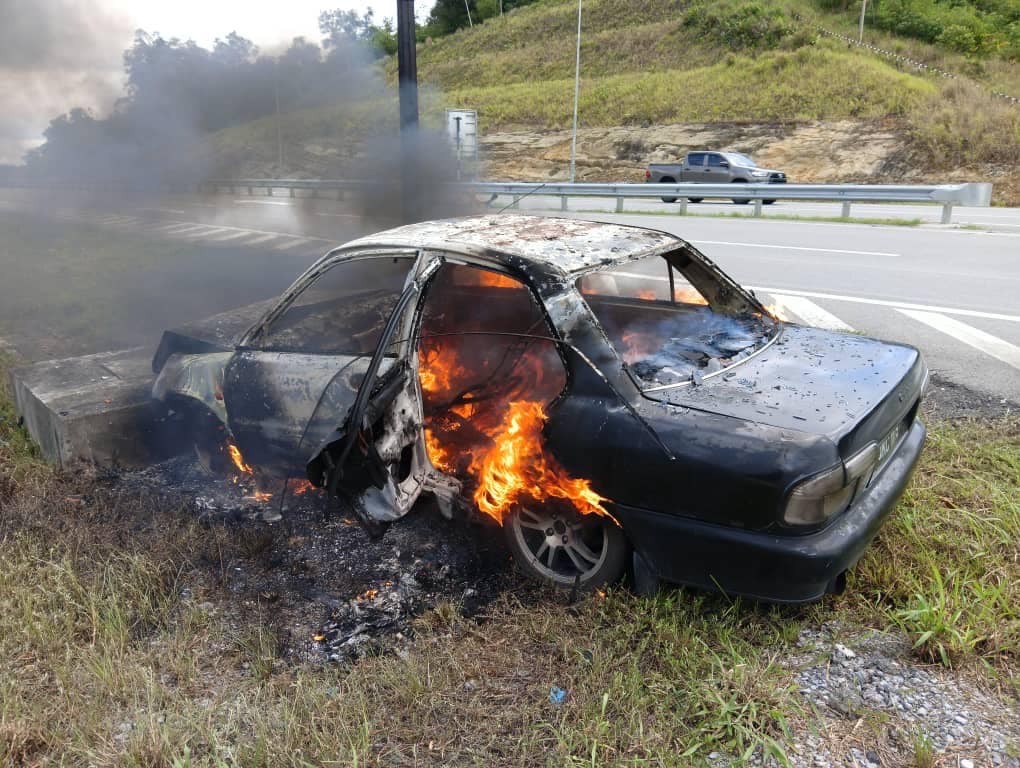 Narrow Escape Man and Boy Survive Fiery Car Crash in Kampung Singai