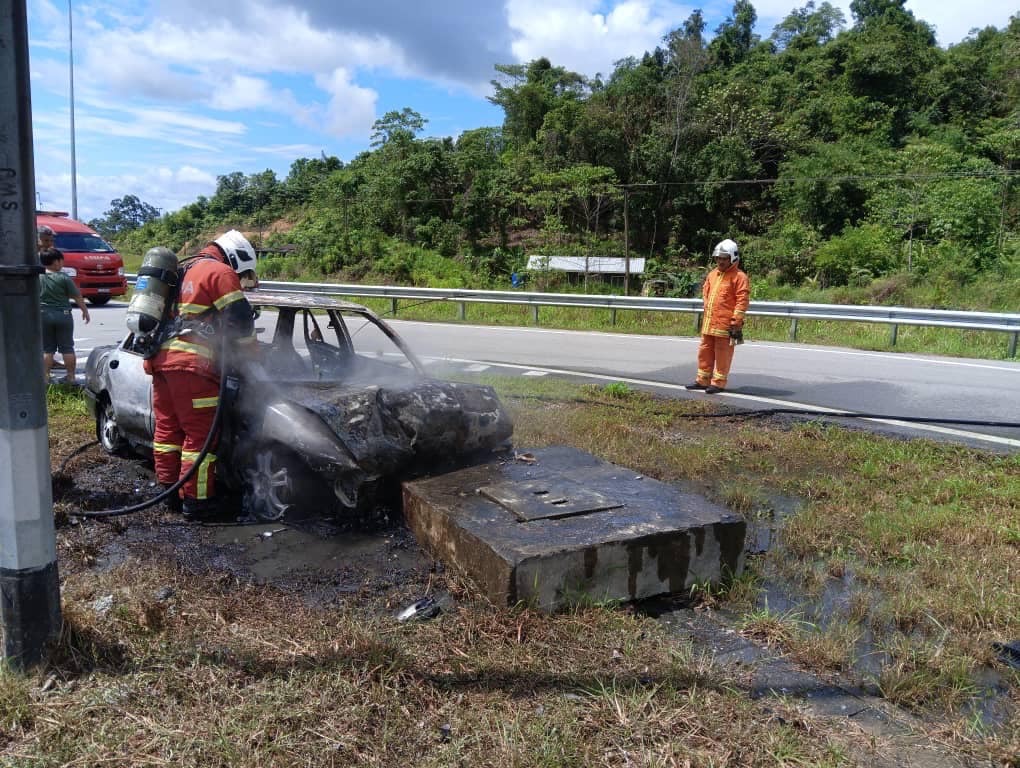 Narrow Escape Man and Boy Survive Fiery Car Crash in Kampung Singai