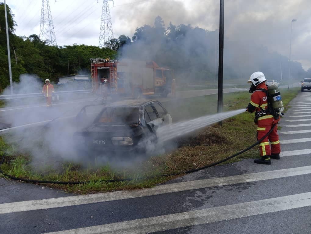 Narrow Escape Man and Boy Survive Fiery Car Crash in Kampung Singai