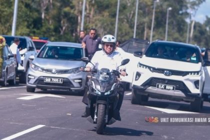 Premier Rides Police Bike Across Marudi Bridge, Marks Sarawak Connectivity Milestone