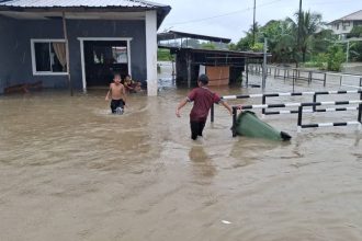 Seven Evacuated in Kuching Flood, Road Damaged in Lundu